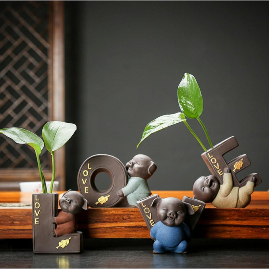 Tượng heo tình yêu- Bộ tượng heo xếp thành chữ LOVE