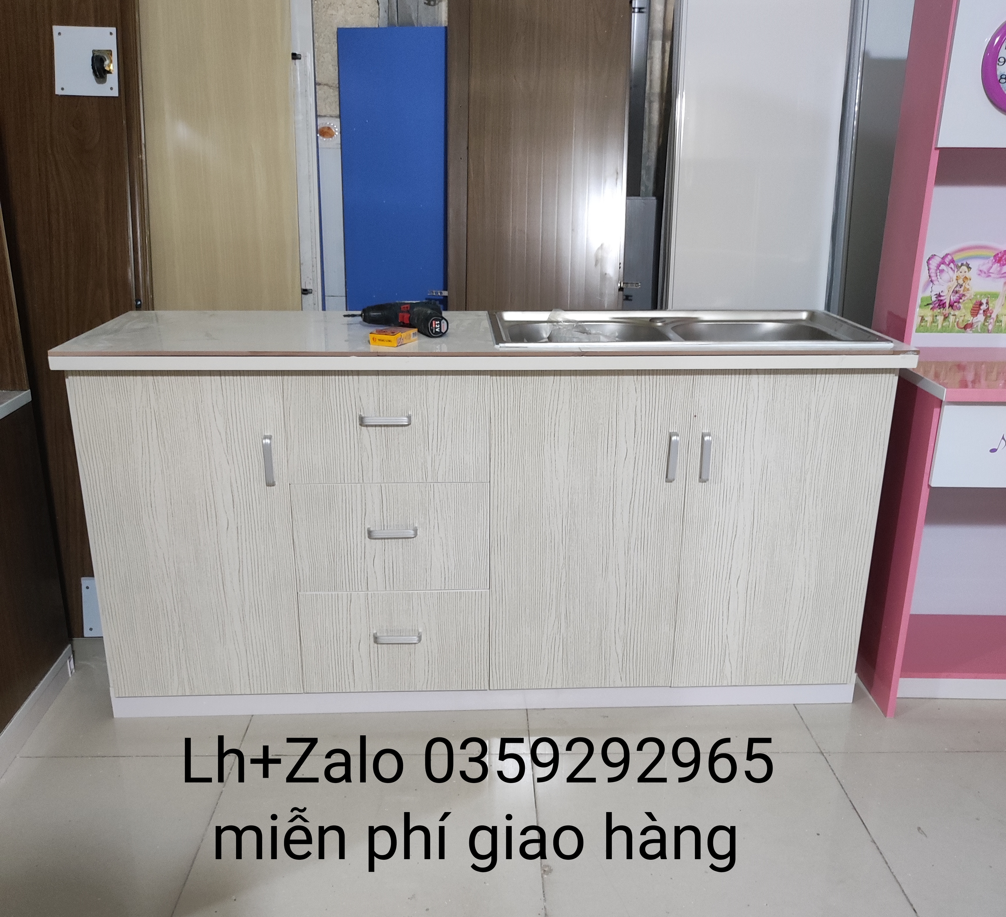 Tủ bếp mini nhựa đài Loan ốp mặt gạch sẵn bồn rửa đôi