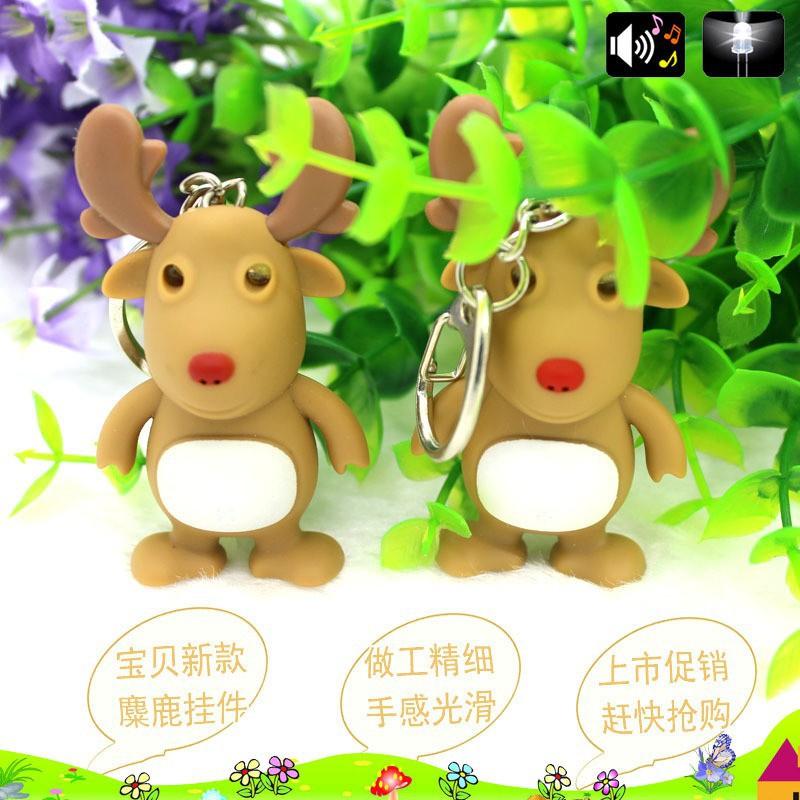 Móc khóa hình con tuần lộc giáng sinh phát sáng đèn Led có đèn có âm thanh