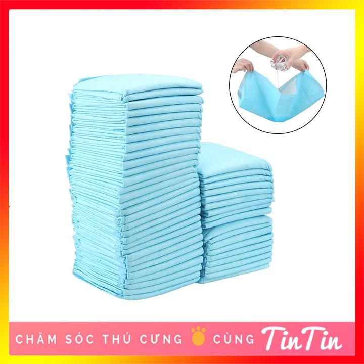 Tã lót cho chó mèo đi vệ sinh vào khay, chuồng bằng giấy siêu thấm hút