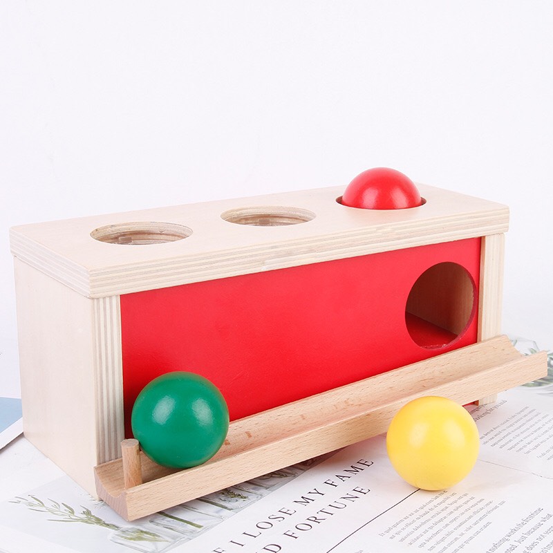 Đồ chơi gỗ phát triển giác quan Montessori cho bé 1-3 tuổi: Hộp ấn bóng