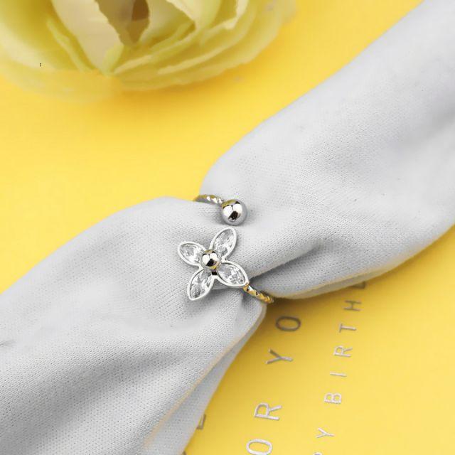 Nhẫn nữ inox hoa mai free size