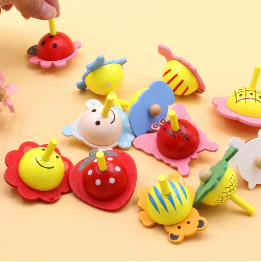 Con quay trẻ em nhiều hình độc đáo - Chất liệu gỗ an toàn thân thiện cho bé - Giao màu ngẫu nhiên