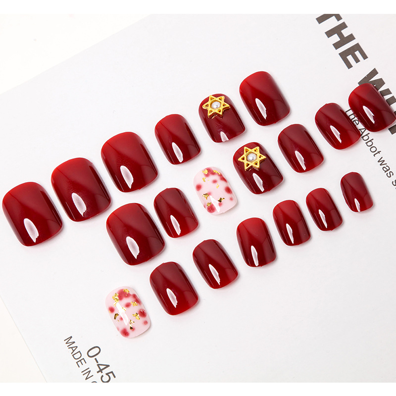 Bộ 24 móng tay giả đỏ đính charm ngôi sao tặng kèm thun lò xo cột tóc màu đen tiện lợi