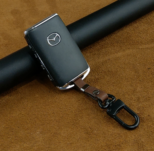 Móc khóa gắn vào chìa khóa xe ô tô Mazda / Toyota / Vinfast / Honda / Ford / Mercedes da bò thật - hàng chính hãng