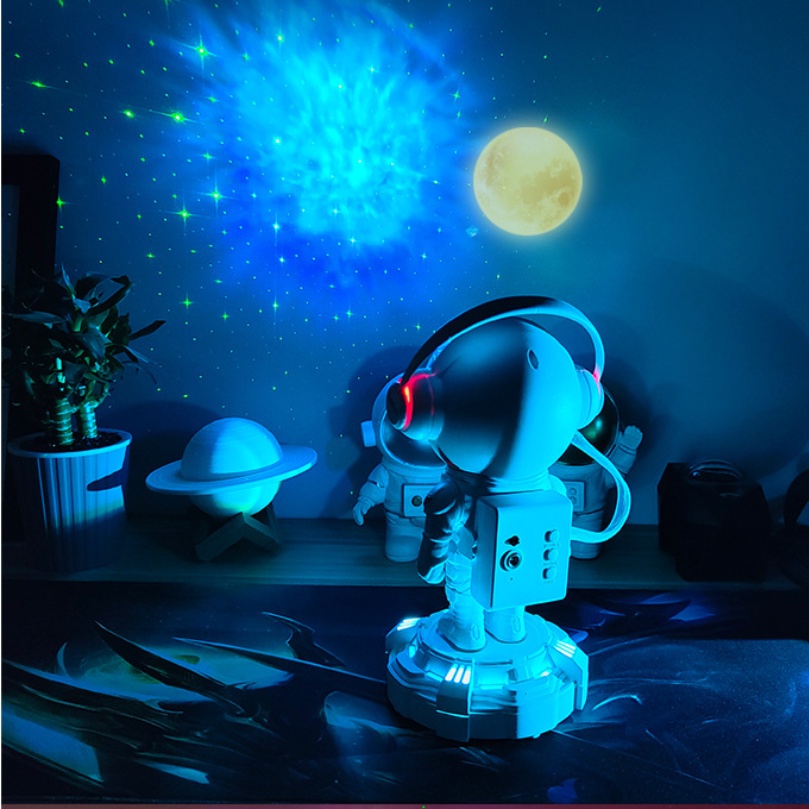 Đèn phi hành gia BENZ tích điện có loa, ánh trăng chiếu bầu trời sao thiên hà phiên bản PREMIUM 2023 điều chỉnh nhiều chế độ qua điều khiển trang trí décor phòng ngủ, bàn làm việc