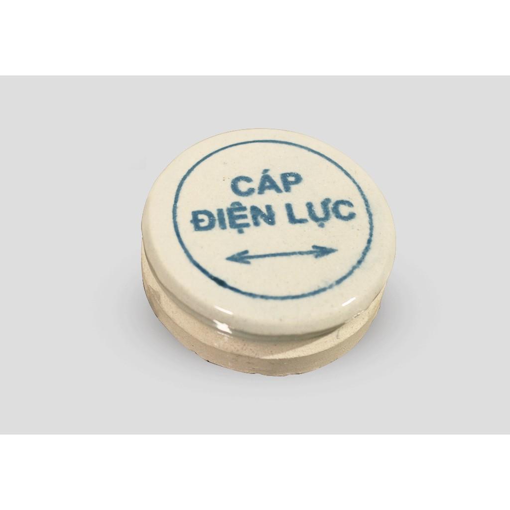 Mốc sứ cảnh báo cáp điện ngầm - hình thật