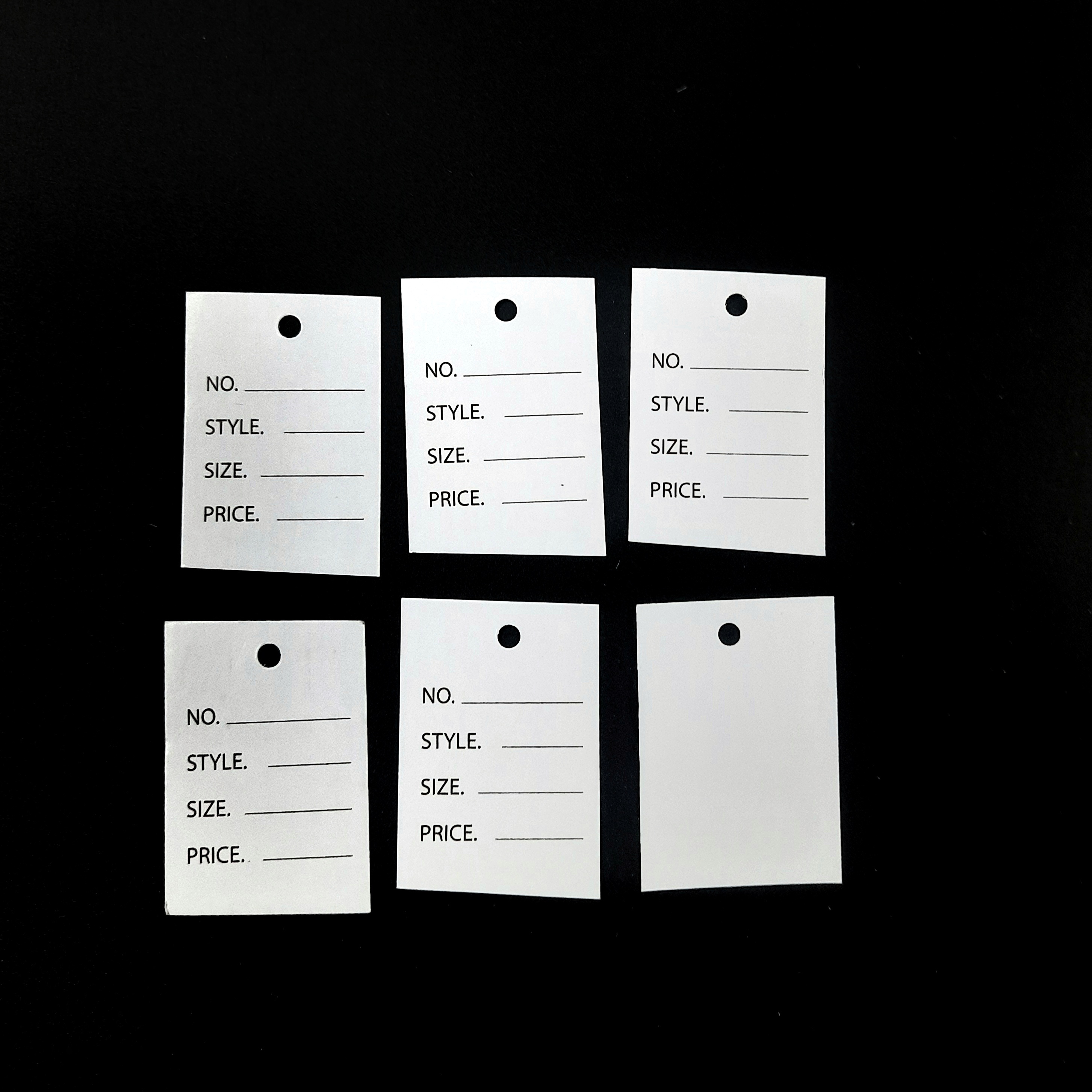 Tag mác quần áo bằng giấy kích thước 5cm * 3.5cm .