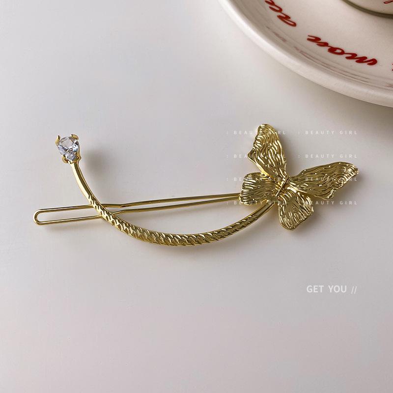 Trâm cài tóc dáng gài họa tiết hồ điệp