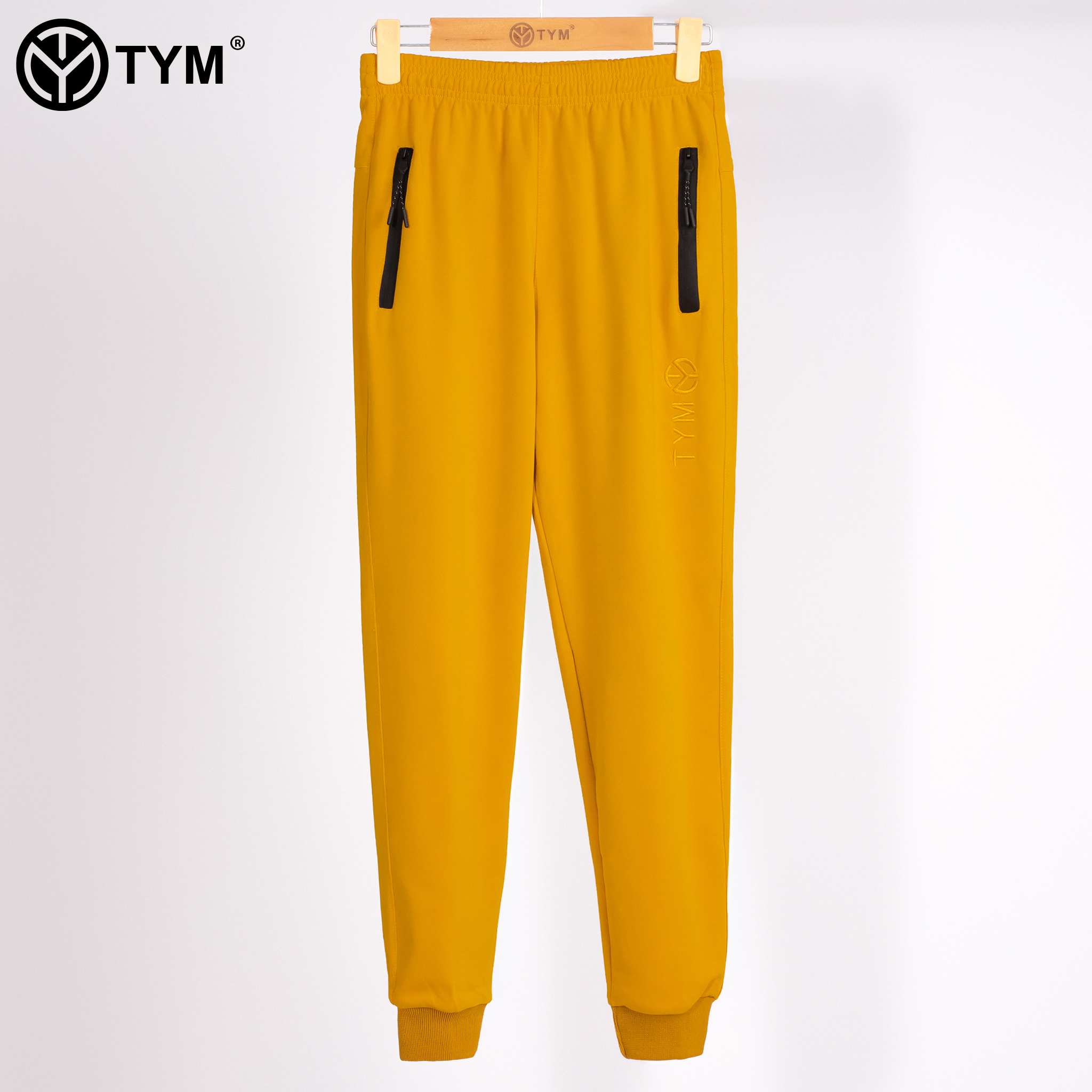 Quần Jogger Thể Thao Unisex Nam Nữ TYM - Vải Poly dày dặn, mịn, mát - Logo thêu - JGMT001 - TYM FASHION