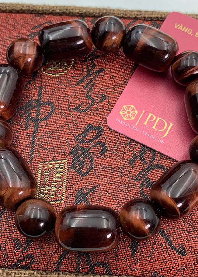 Vòng Đá Mắt Hổ Đỏ Lu Thống