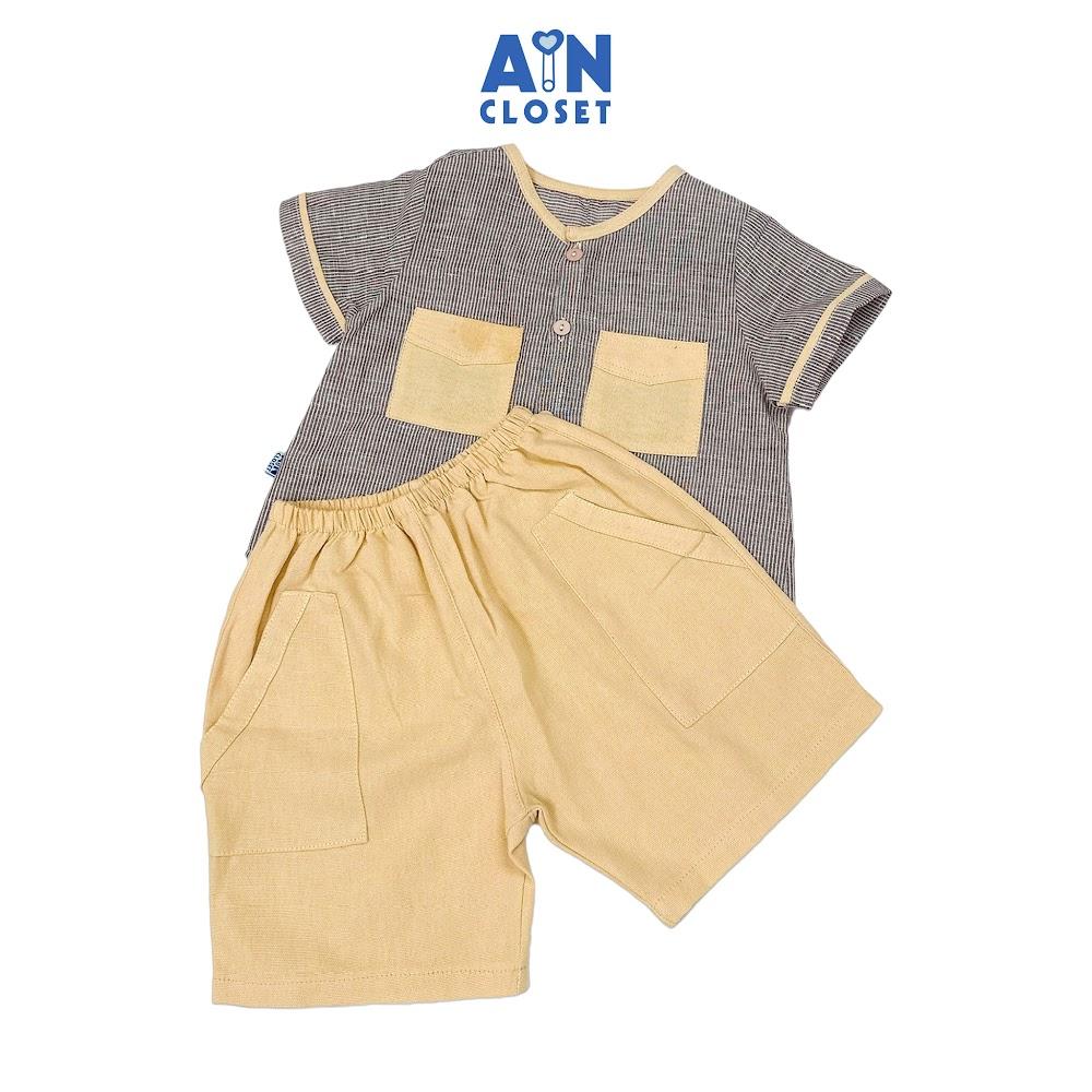 Bộ quần áo Lửng bé trai hoạ tiết Kẻ Nhí Kem Cotton - AICDBTTQM0MO - AIN Closet