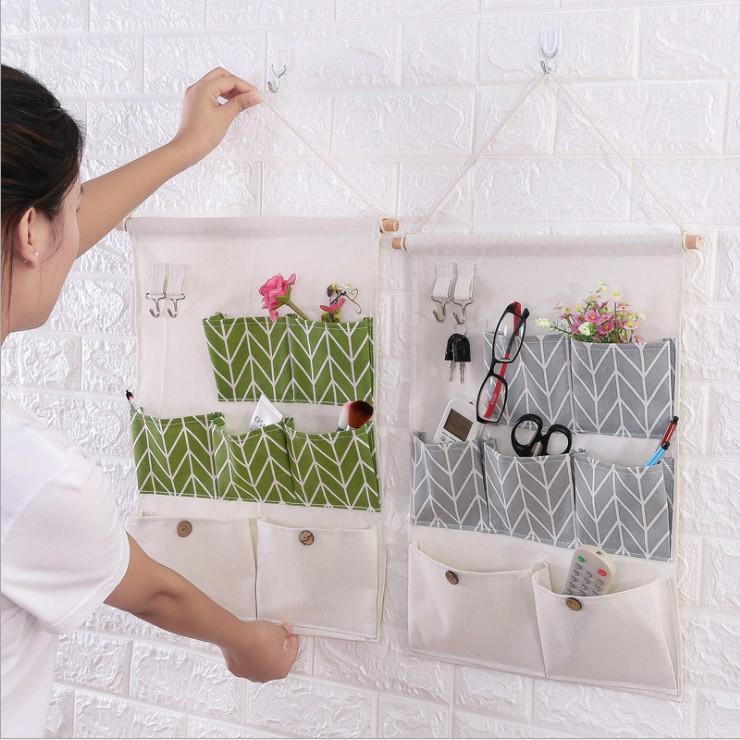 Túi đựng đồ đa năng vải canvas bền đẹp treo tường 7 ô kèm 2 móc treo tiết kiệm diện tích - giao màu ngẫu nhiên