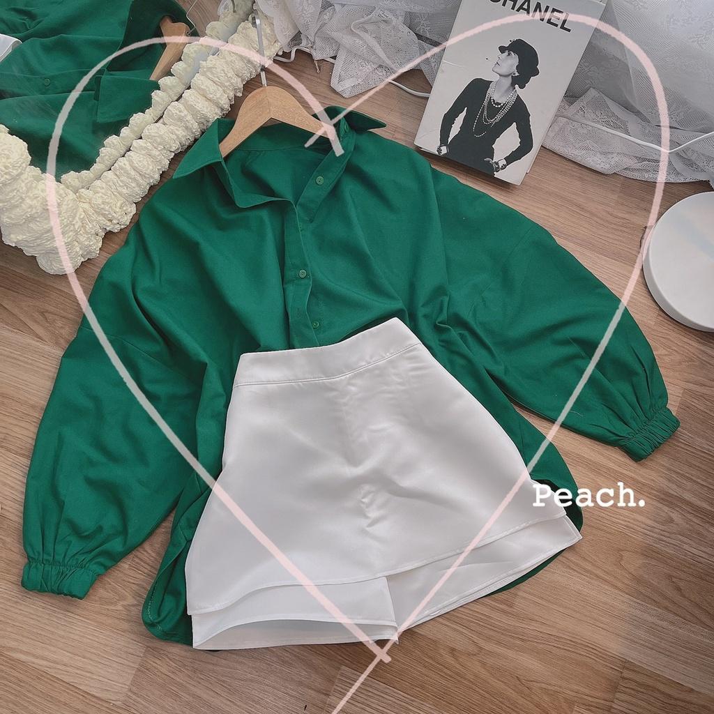 Set áo sơmi xanh tay bo tà lệch phối quần short trắng