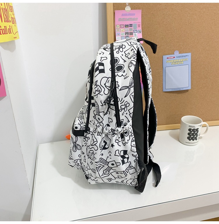 Balo vải học sinh, sinh viên thời trang in hình Doodle Dụng cụ học tập lạ mắt