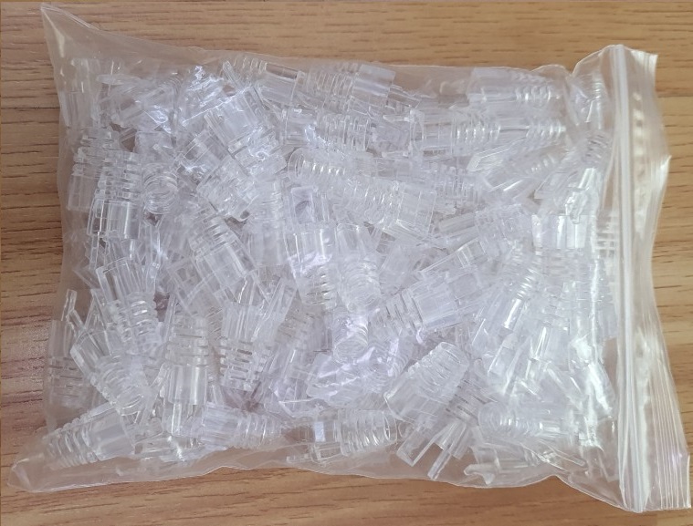 Đầu chụp hạt mạng RJ45 Cat5e, Cat6 màu trắng trong có móc gài