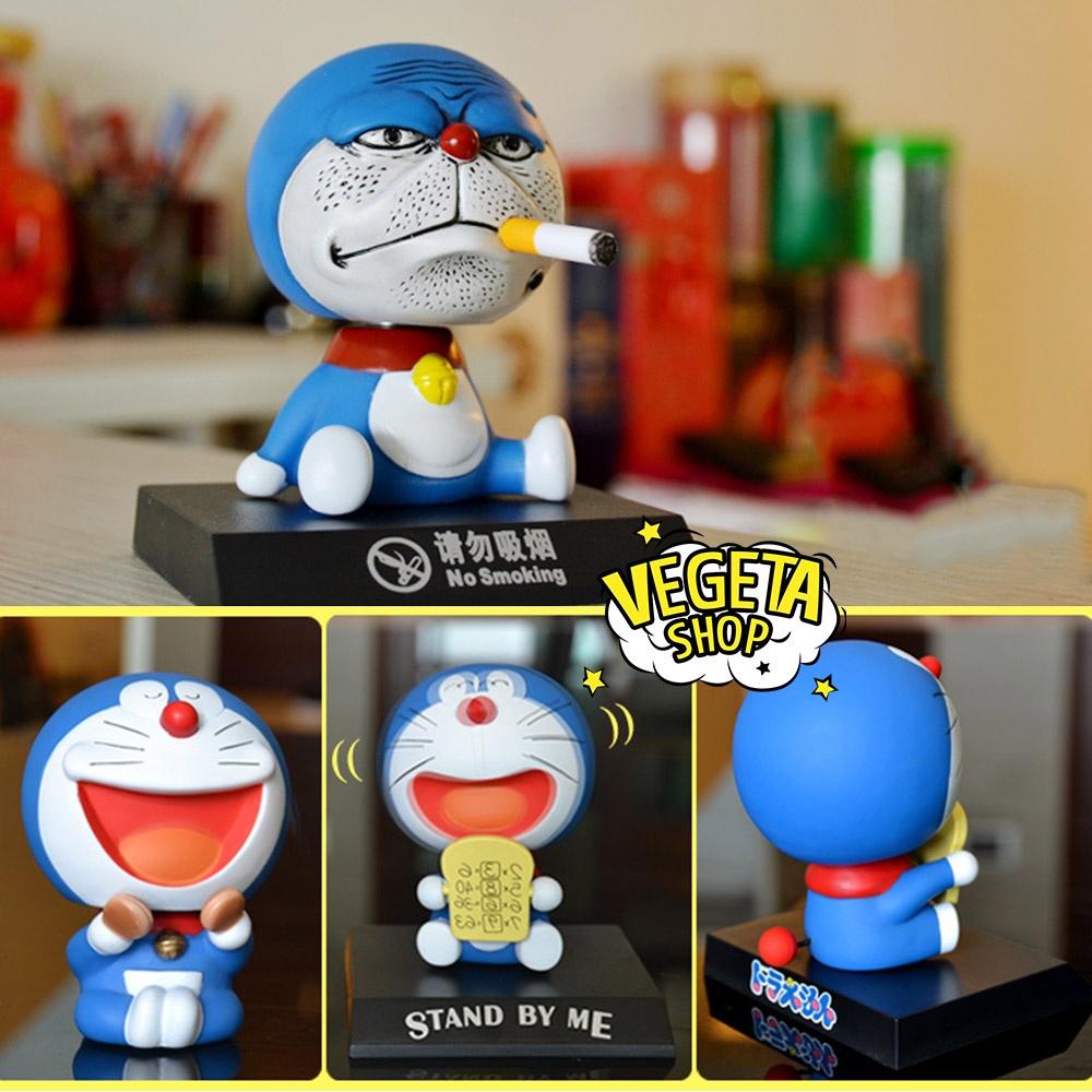 Mô hình mèo ú Doraemon Doremon gật gù trang trí - Giá đỡ điện thoại bàn làm việc bàn học tủ sách taplo ô tô quà tặng