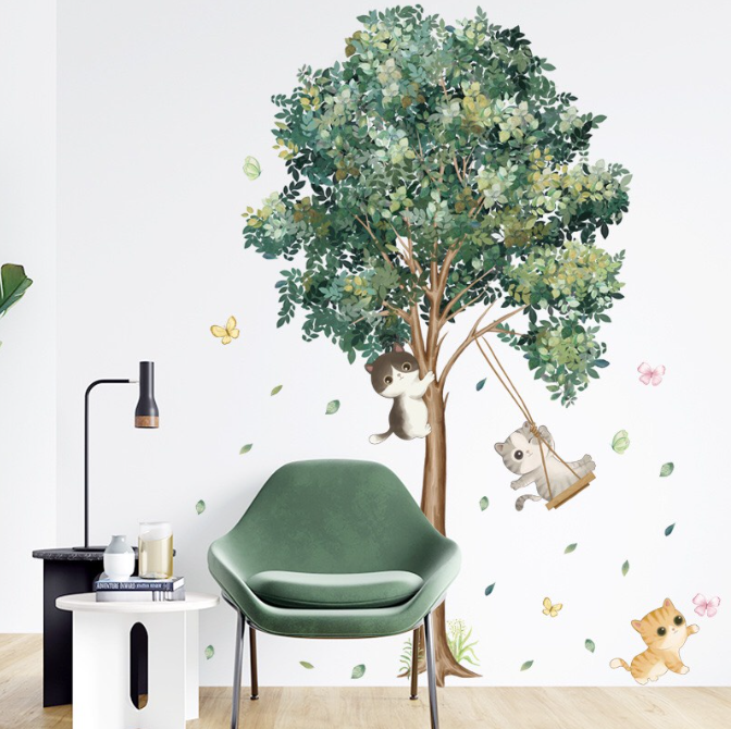 Decal trang trí tường - Chú mèo ngồi xích đu trên cây xanh