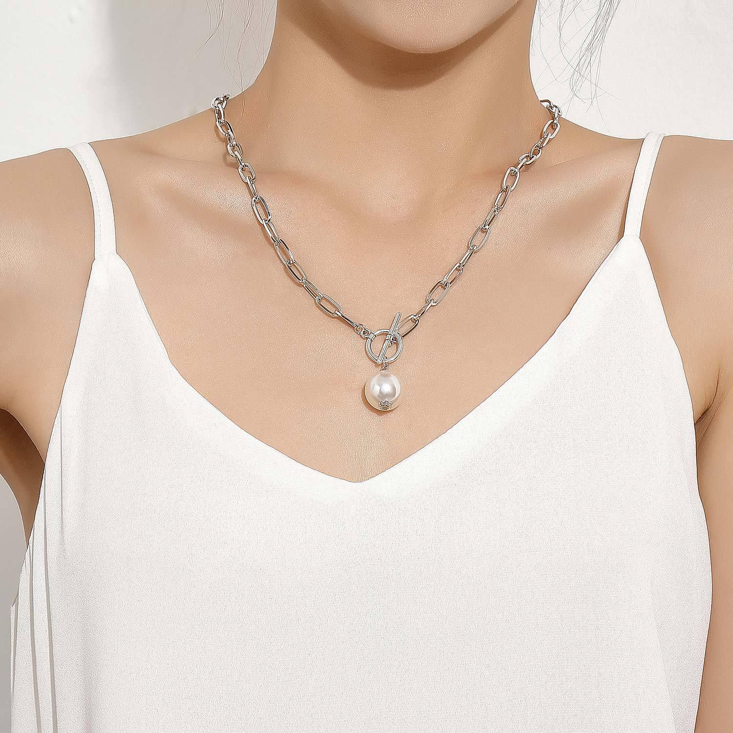 Vòng cổ titan mix ngọc trai sành điệu