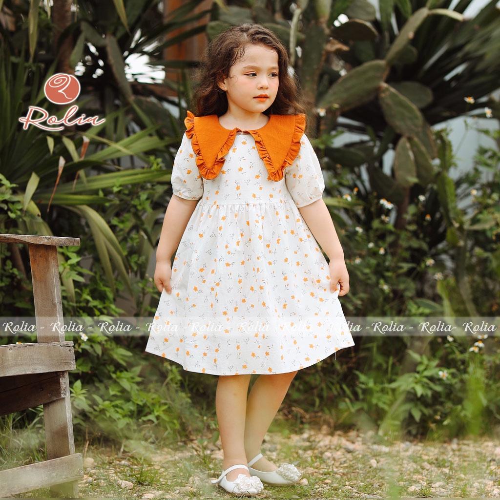 Váy bé gái trắng hoa nhí ROLIA cổ cách điệu chất thô Hàn cao cấp sờ mềm và mát V110