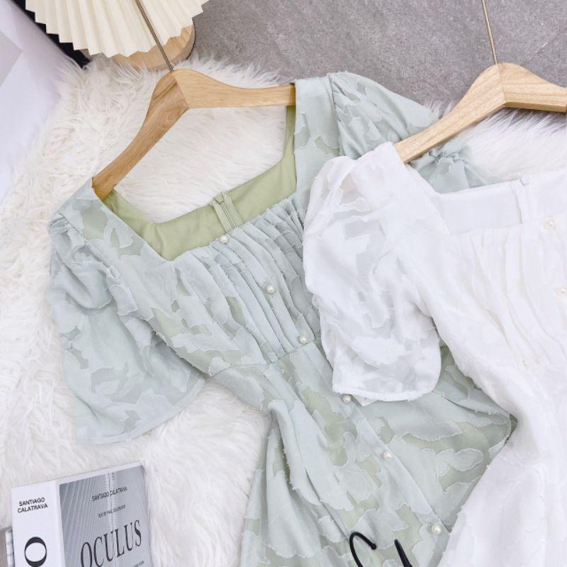 Đầm xếp ly ngực phối cúc ngọc