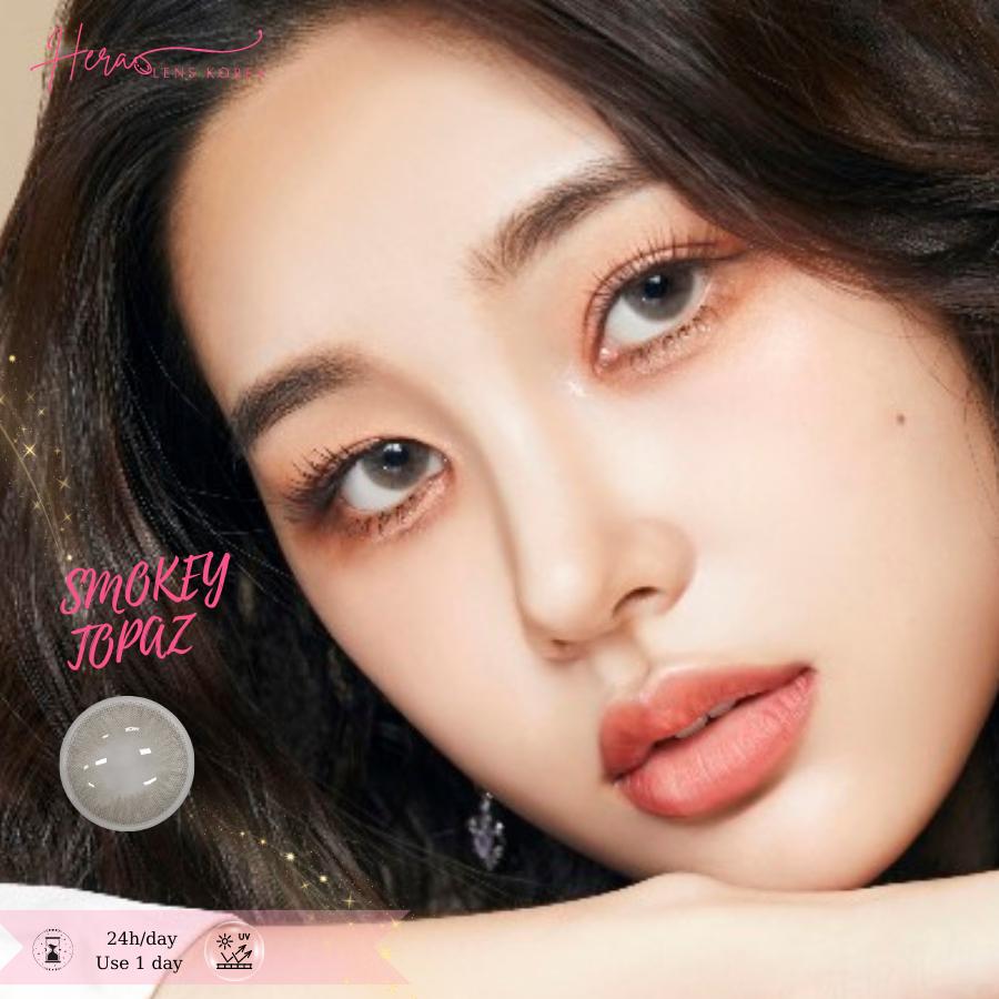 Kính Áp Tròng Hera Xám Bóng Đá Không Độ SMOKEY TOPAZ Nhập Khẩu Hàn Quốc Lens Không Cận 1 Ngày