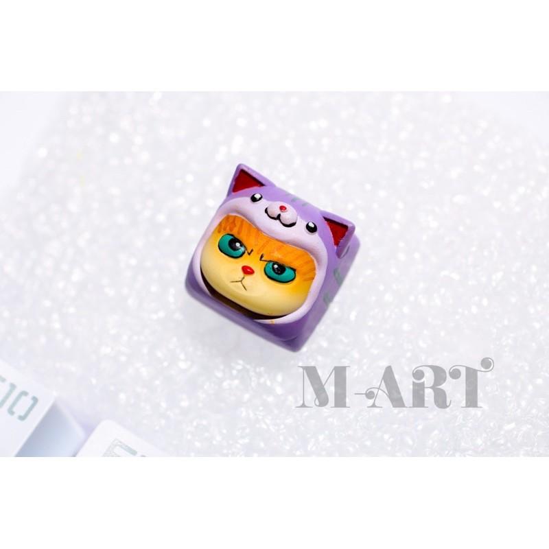 Keycaps mèo dễ thương và chiếc mũ màu tím