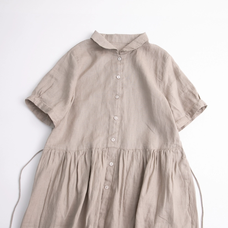 Đầm nữ chất liệu linen thoáng mát , có kết hợp giữa xẻ tà và cúc chạy dọc kèm dây rút eo tiện lợi , dáng babydoll siêu xinh Da216