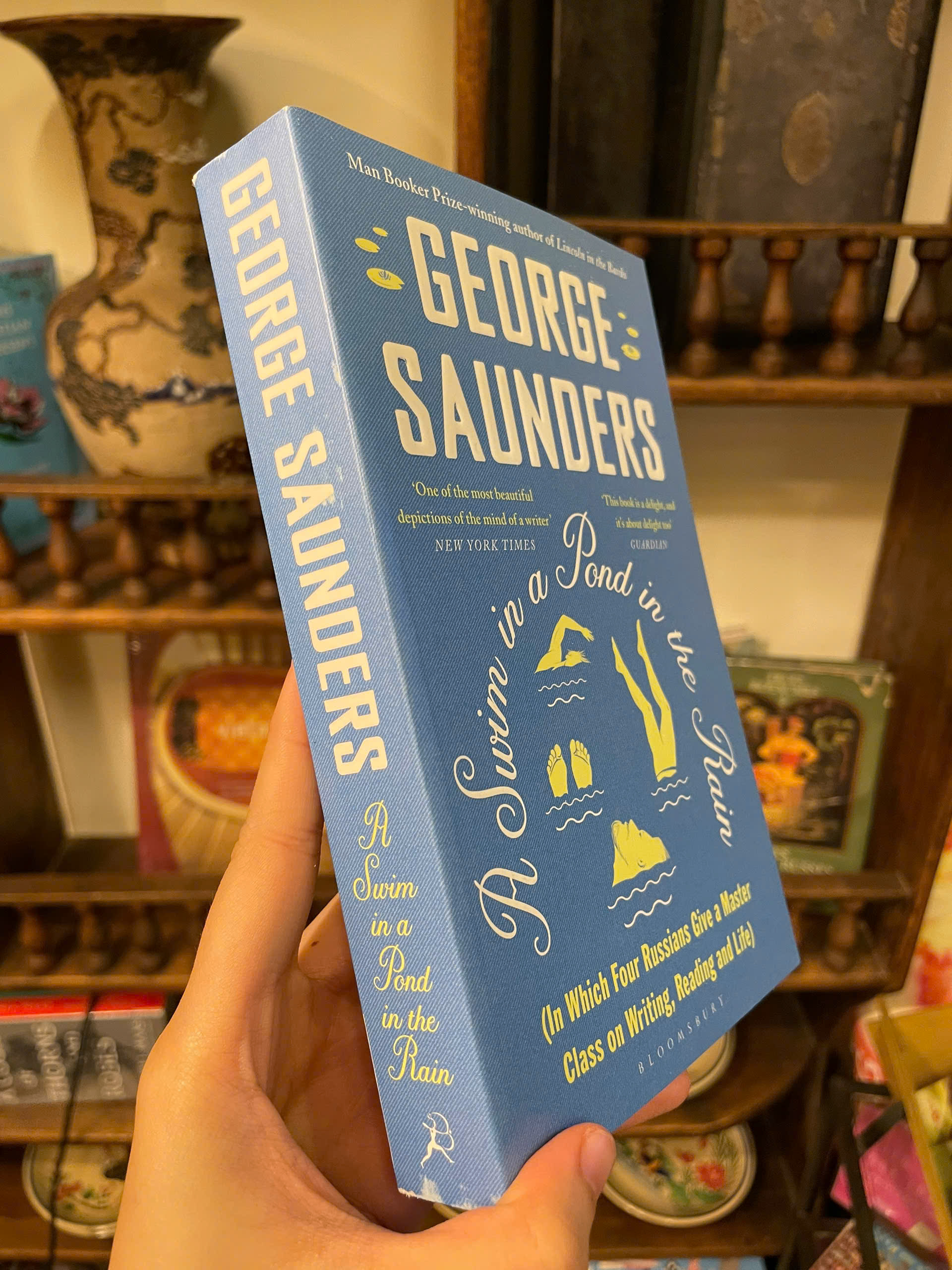 Sách - A Swim in a Pond in the Rain (New York Times Bestseller) by George Saunders | English Stories