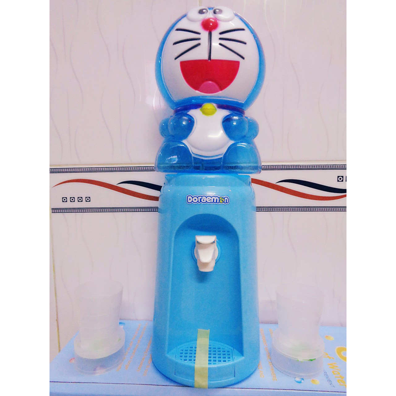 BÌNH NƯỚC 2 LÍT KUTE CÓ VÒI TẶNG KÈM 2LY GẤP GỌN