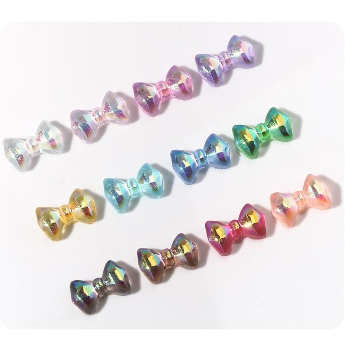 Charm nơ tráng gương cầu vòng đính móng BYH004