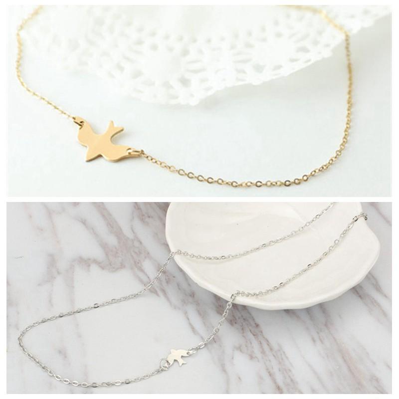 Dây chuyền kim loại mạ vàng mặt chim bồ câu