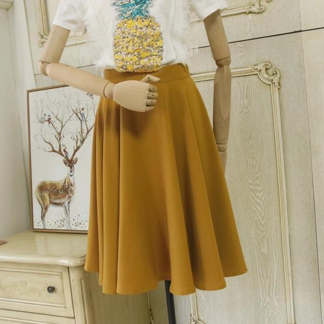 Chân váy xoè 55cm dáng vừa tới gối chất liệu tuyết mưa