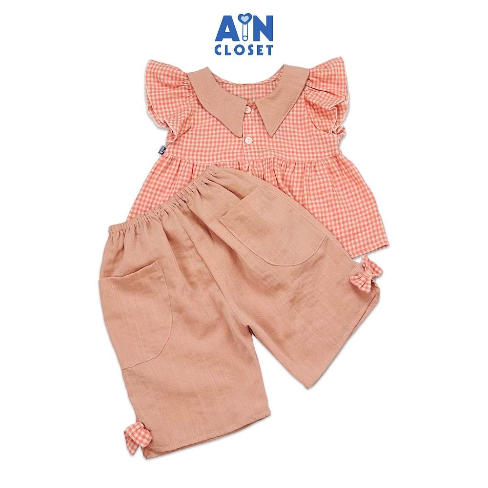 Bộ quần áo lửng bé gái họa tiết Sơ mi Caro hồng cam cotton - AICDBGCNEGQJ - AIN Closet