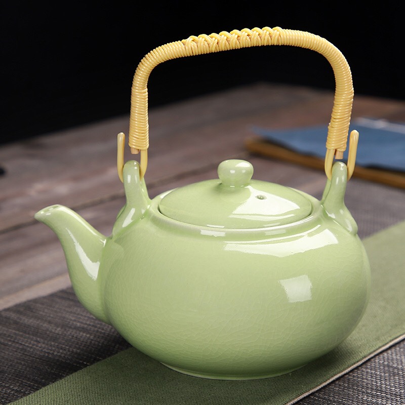 Bộ bình trà Ngọc Lộ Khai Tâm 1 bình 6 tách chất liệu đất cao lanh và men tráng sứ PK000567