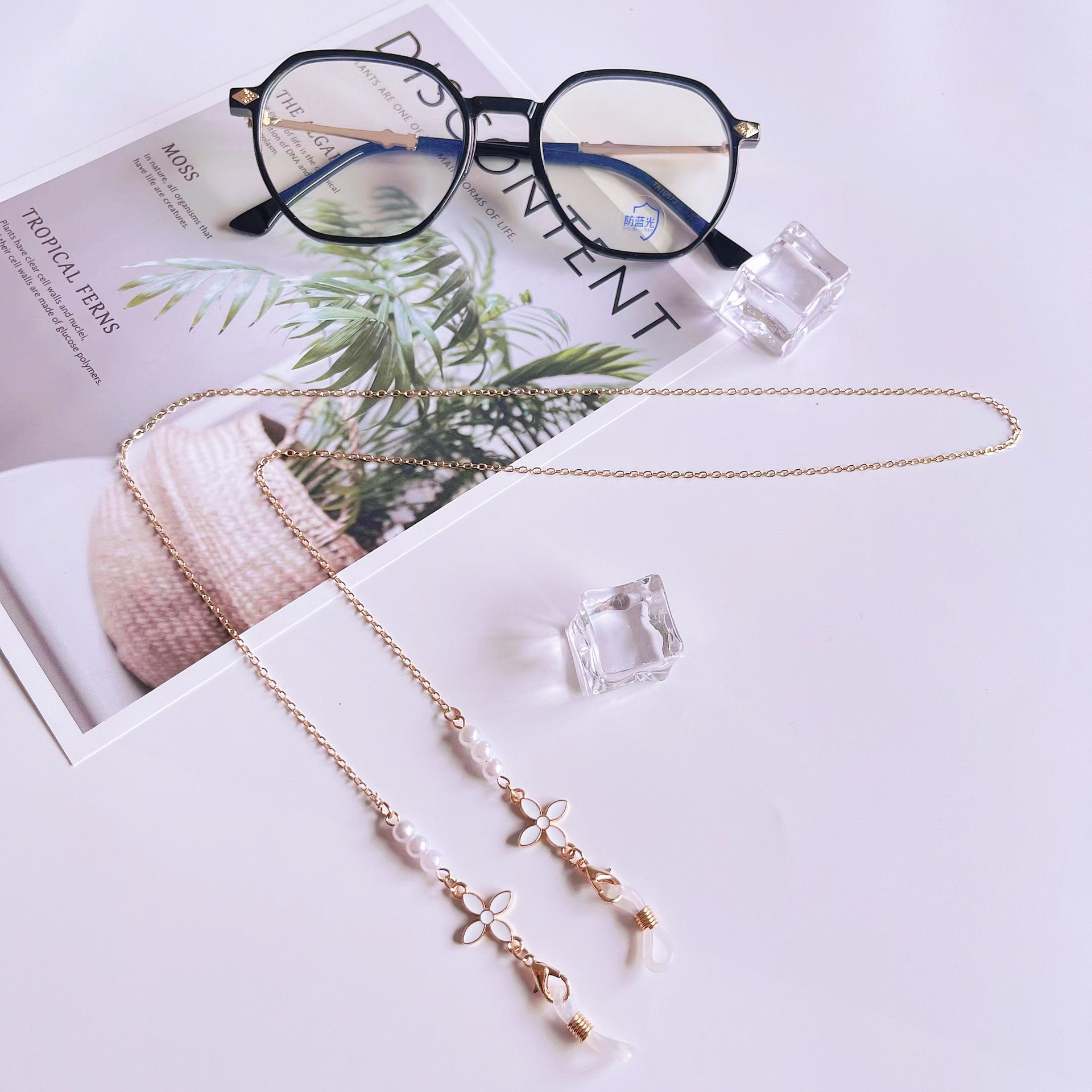 Dây chuyền mặt nạ cỏ bốn lá Dây đeo kính ngọc trai đơn giản Dây đeo mặt nạ đa năng Dây chống thất lạc tai nghe