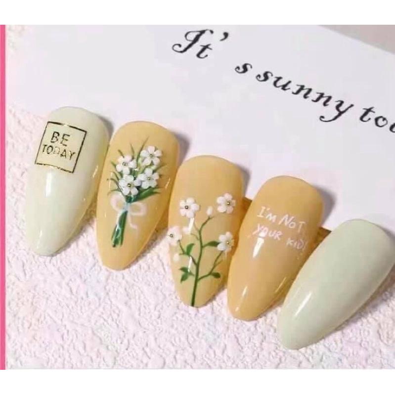 Hoa nhí trắng gắn móng tay, hoa nhựa