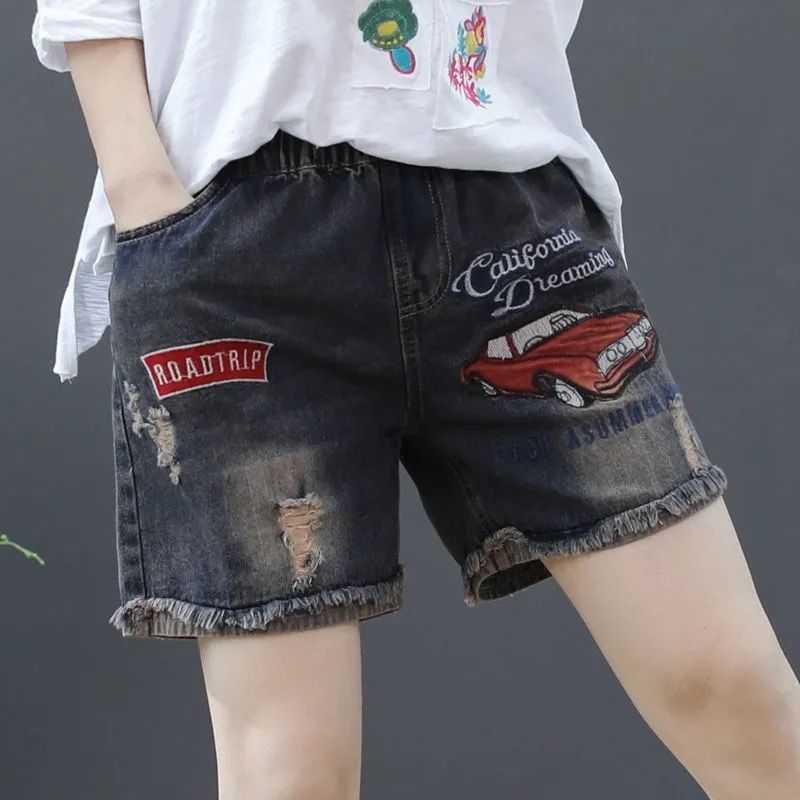 Quần Short Jean Lưng Cao Ống Rộng Thêu Họa Tiết Thiết Kế Rách Cá Tính Cho Nữ