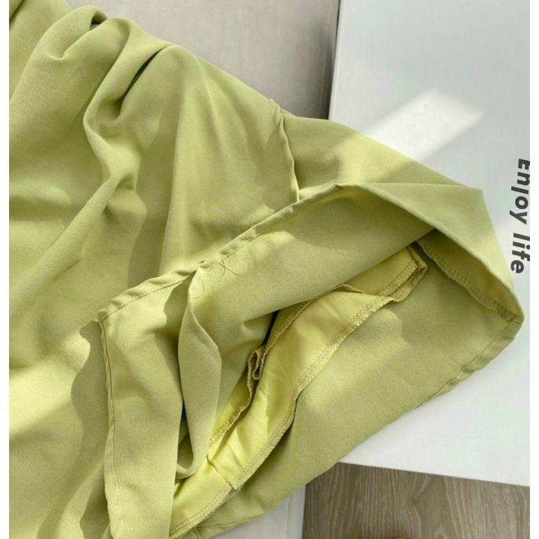 Đầm yếm hở lưng màu trắng xanh