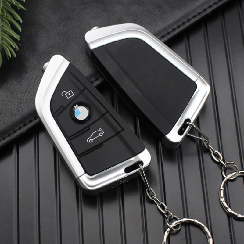 Bật lửa hộp quẹt khè móc khóa xe hơi BMW nắp trượt - xài gas