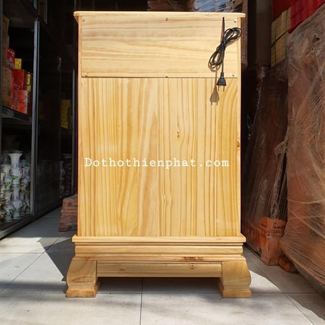 Bàn thờ thần tài ông địa gỗ thông ngang 56 cm quỳ trụ điện tử mẫu rất đẹp