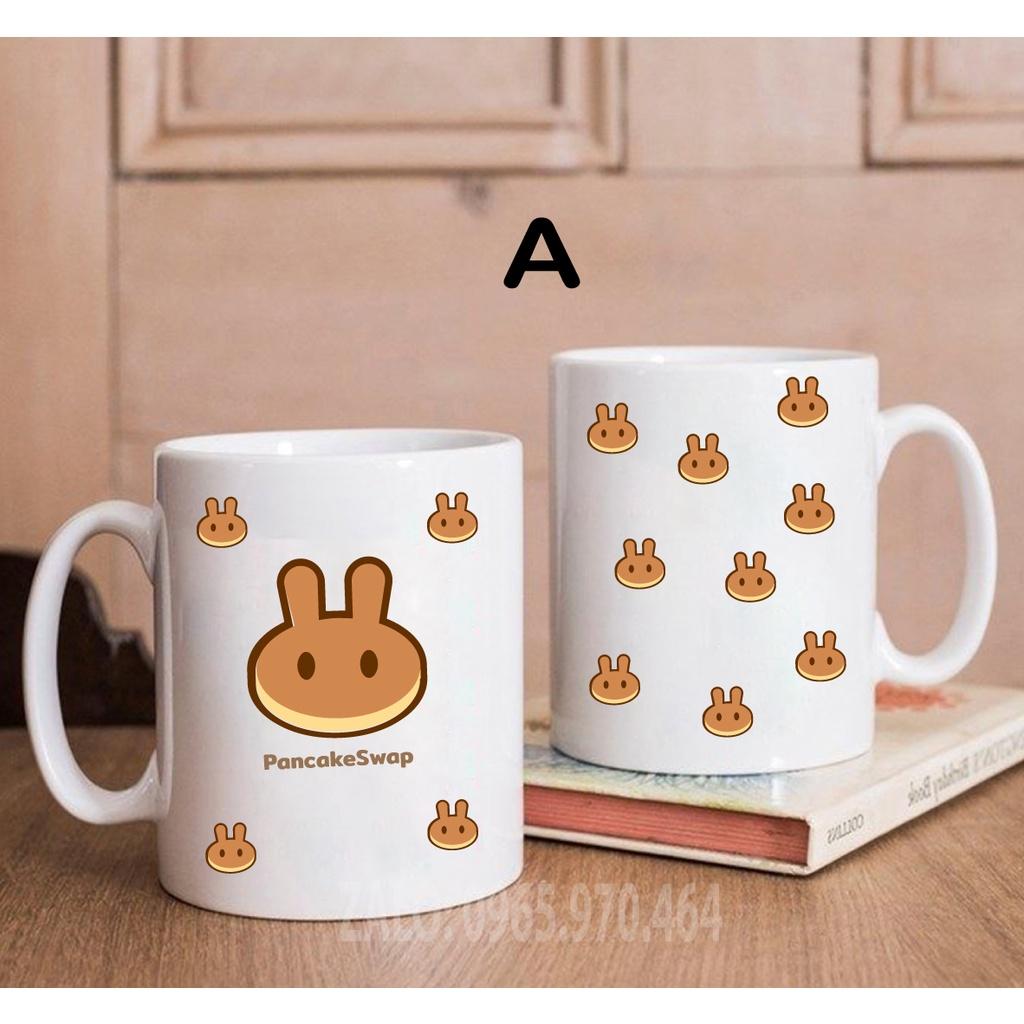 Ly Sứ Có Quai Họa Tiết Đồng Coin PANCAKESWAP - In hình lên ly sứ, cốc theo yêu cầu của bạn - IN HÌNH LỚP, CÔNG TY