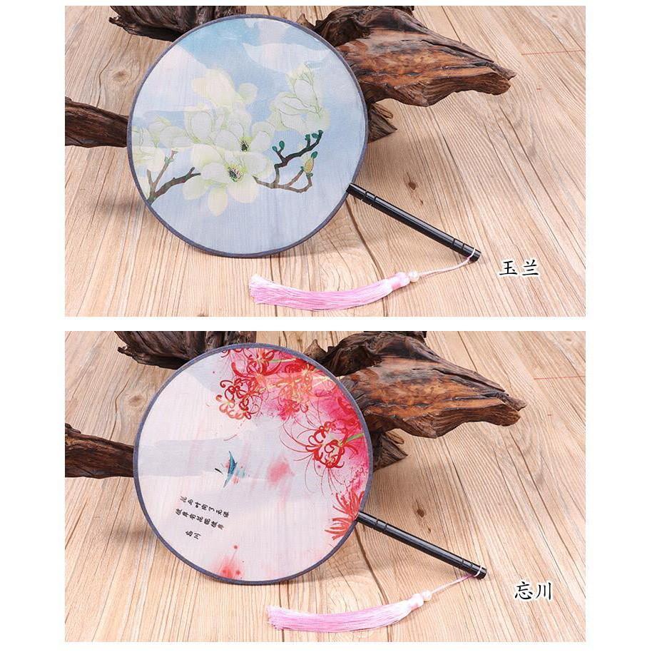 Quạt trong suốt mẫu hoa bỉ ngạn in hai mặt