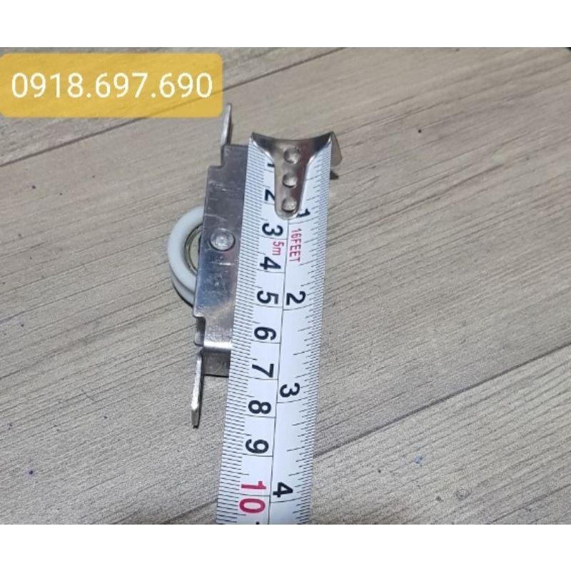 Bánh xe inox dập lỗ cửa sổ lùa nhôm xingfa chịu lực tải 80kg