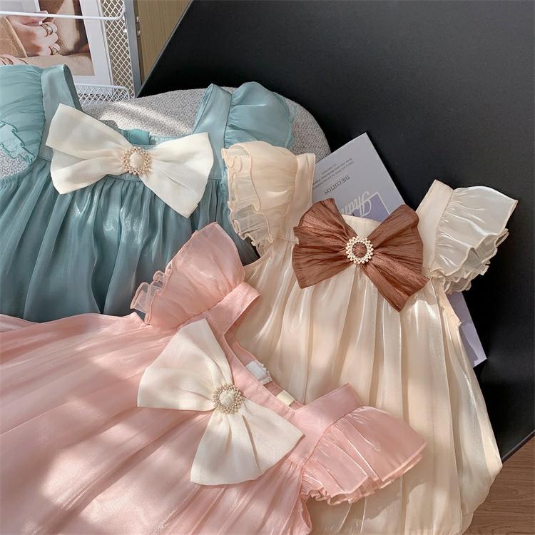 Đầm babydoll cho bé gái đính nơ cánh tiên phong cách Hàn Quốc từ 12-35kg chất vải tơ mềm mát