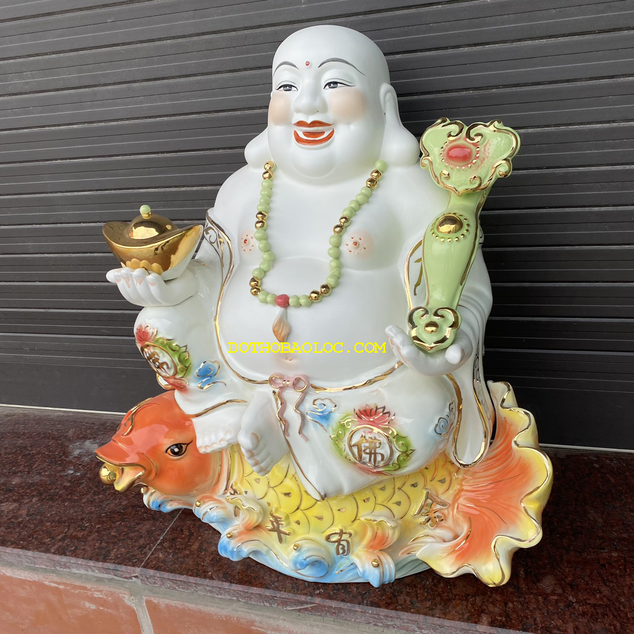 Tượng Di Lặc men sứ ngồi trên cá chép hóa rồng cao 50cm