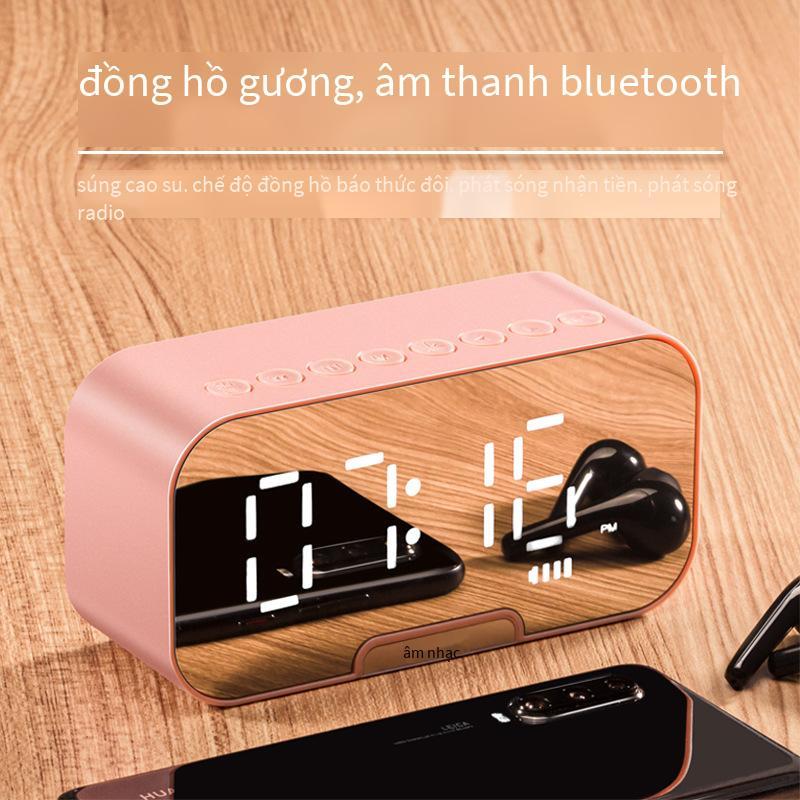 Phong cách mới nhất loa Bluetooth di động không dây loa siêu trầm mini âm thanh máy tính để bàn gương đồng hồ đồng hồ báo thức thẻ đài phát thanh