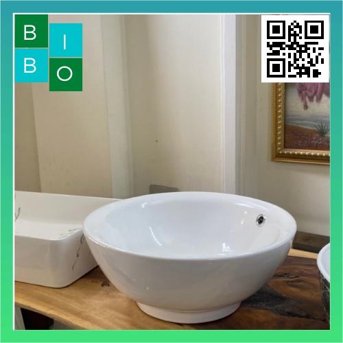 Lavabo tròn đặt bàn màu trắng