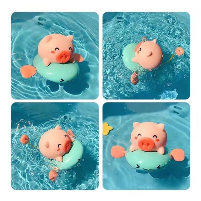  Đồ chơi nhà tắm Lợn con chèo thuyền phun nước chú lợn nước đi bơi