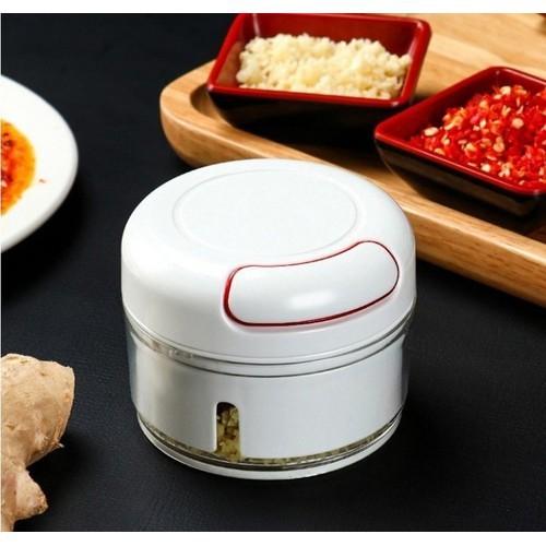 Dụng cụ xay gia vị cầm tay